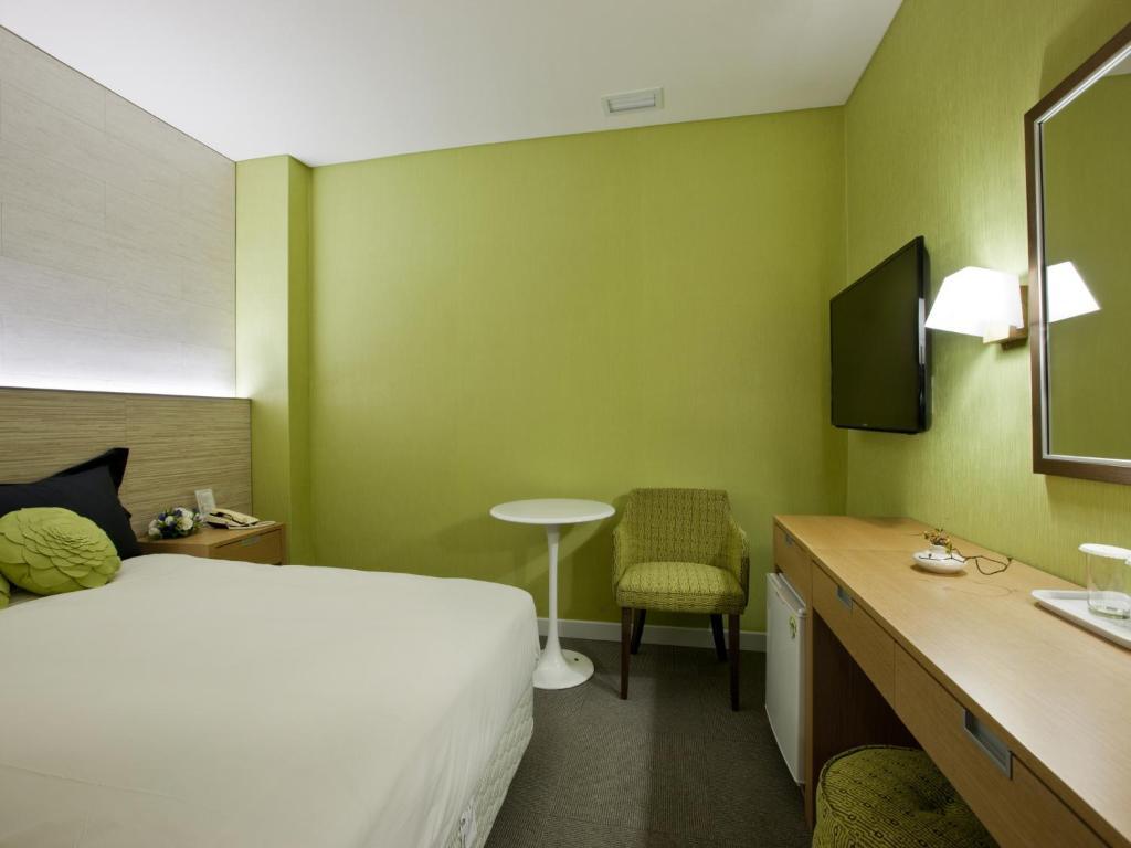 Central Tourist Hotel Seúl Habitación foto